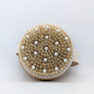 Brosse de massage anti-cellulite et pour activer la circulation lymphatique. 